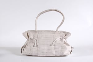 Crocodile leather makes for very elegant and attractive handbags.